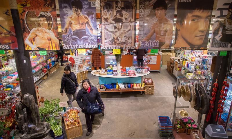 Customers browsing Pearl River Mart's wide selection of merchandise.
