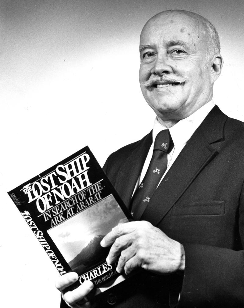 Promotional photo of Charles Berlitz with one of his later books.