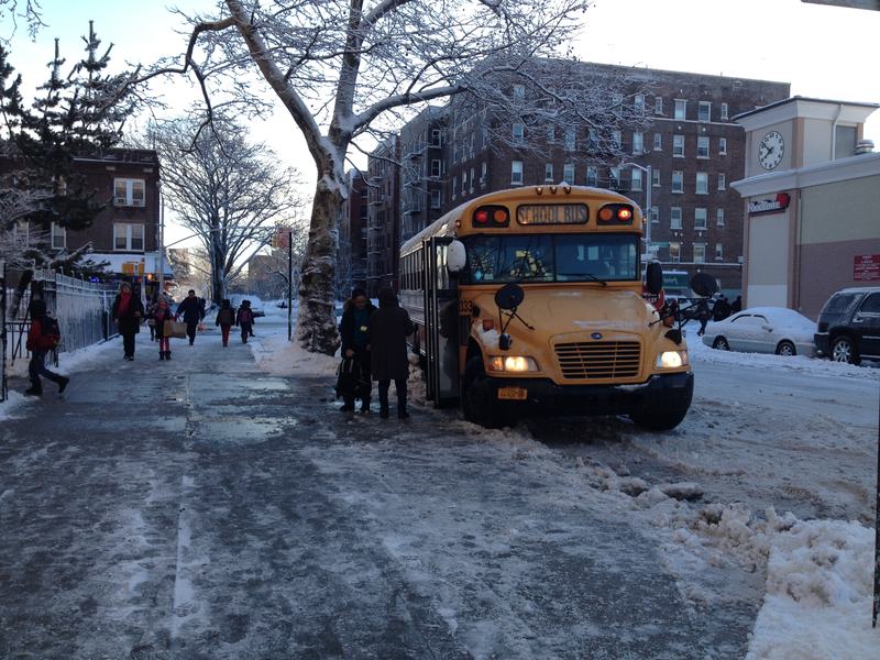 A school bus arrives at PS 230 in Brooklyn on Friday, February 14.