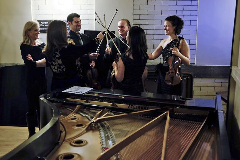 Pianist Simone Dinnerstein and the Chiara String Quartet backstage before their performance at the Library of Congress