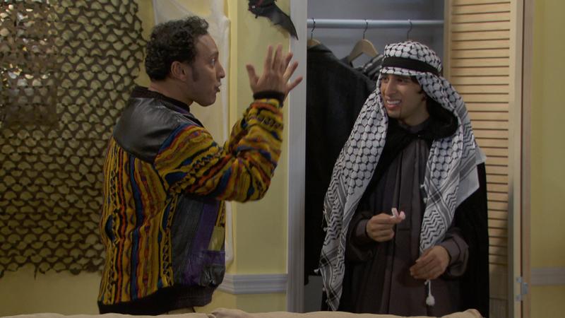 Aasif Mandvi and Nicky Maindiratta in a scene from 'Halal in the Family'