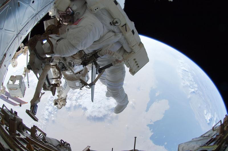 Ron with his feet over Saudi Arabia on the last spacewalk of the Space Shuttle era, July 12, 2011