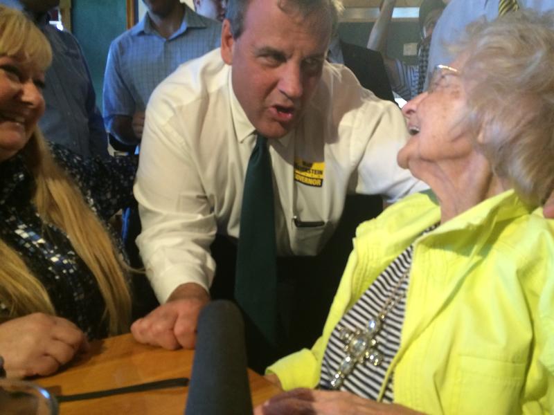 Gov. Christie greets 102-year-old Clemence Blanchard and her daughter, Summer Hebert, at T-Bones restaurant in Bedford, NH.