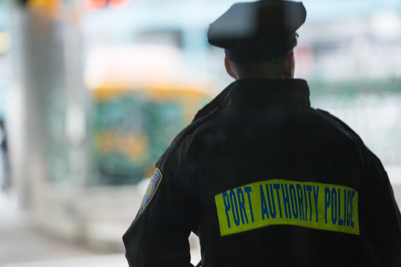 A Port Authority police officer stands guard at LaGuardia Airport.