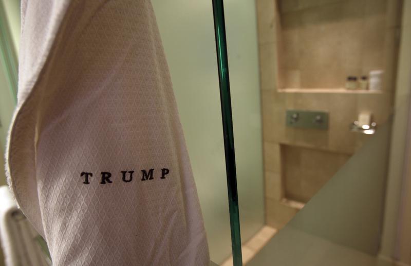 A bathrobe hangs in a room at the Trump Ocean Club International Hotel and Tower in Panama City. Whether he wears one at the White House is being disputed.