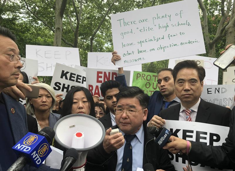 City Council Member Peter Koo speaks out against ending the test-based admissions policy for specialized high schools at a rally at City Hall on June 5th, 2018.