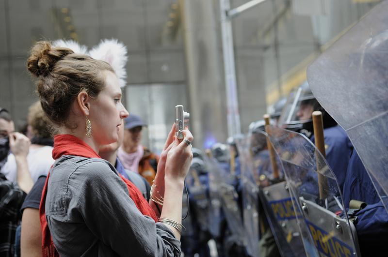 Toronto Riot Police (r) restrict protesters from entering G20 Summit area at the Metro Convention Centre on June 26, 2010 in Toronto, Canada.