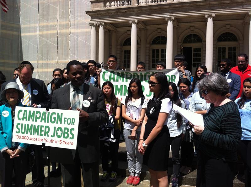 City Councilman Mathieu Eugene addresses a rally as part of the Campaign for Summer Jobs.