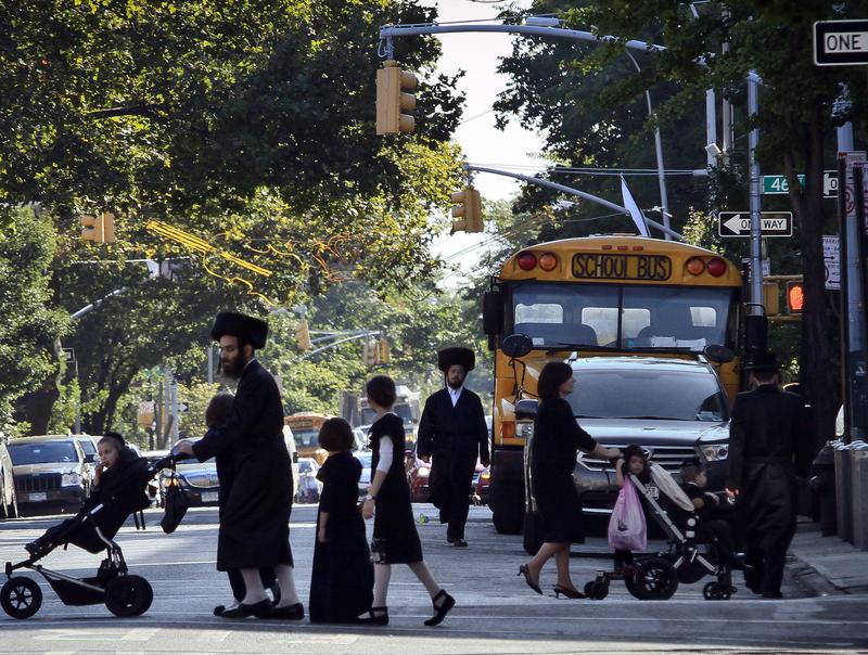 Families outside a Yeshiva in Borough Park, Brooklyn