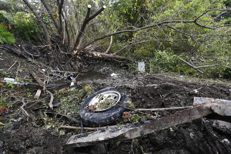 Debris scatters an area Sunday, Oct. 7, 2018, at the site of yesterday's fatal crash Schoharie, N.Y.