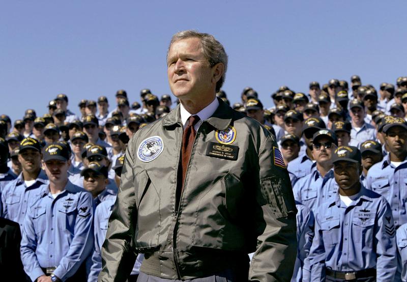President Bush is introduced to speak to sailors near Jacksonville, Fla, 2003.  Bush reaffirmed his determination to win the war on terror and to rid Iraq of Saddam Hussein in his speech.