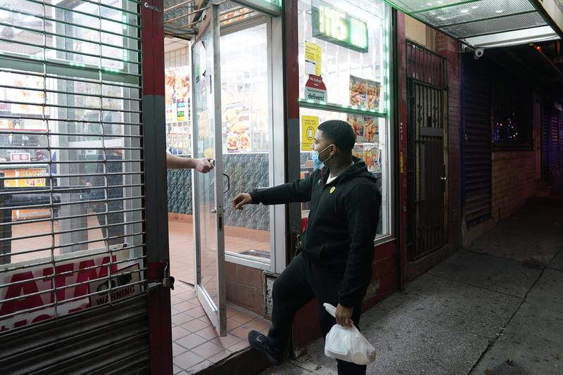 In some parts of New Jersey's largest city residents are facing a 9 p.m. curfew for at least the rest of the month as officials seek to stop a surge in coronavirus infections.