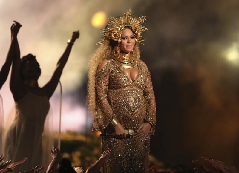 This Feb. 12, 2017, file photo shows Beyonce performing at the 59th annual Grammy Awards in Los Angeles. Beyonce debuted her newborn twins Sir Carter and Rumi in an Instagram post on July 13, 2017.