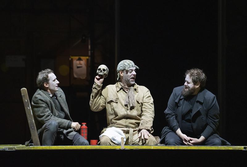Jacques Imbrailo as Horatio, John Relyea as the Gravedigger, and Allan Clayton in the title role of Brett Dean's "Hamlet." 