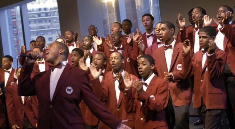 Justin Austin in middle school with the boys choir of Harlem performing at the opening of Jazz at Lincoln Center in Columbus Circle