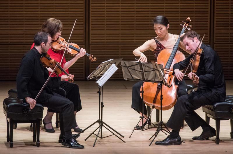 The Brentano String Quartet performs a piece of music.