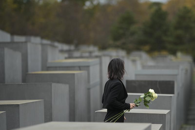 German Foreign Minister Annalena Baerbock places flowers at The Memorial to the Murdered Jews of Europe, known as Holocaust Memorial to commemorate on the 85th anniversary of the November 1938 progrom