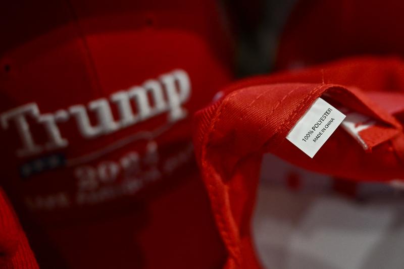 Hats supporting US President Donald Trump with a made in China label are for sale at a store on April 11, 2025 in New York City.
