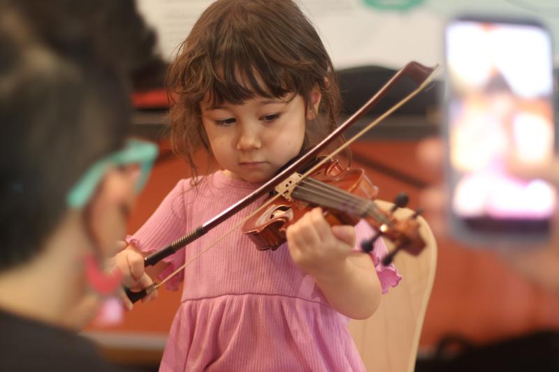The Brooklyn Conservatory of Music come prepared with extra small violins for our littlest listeners!