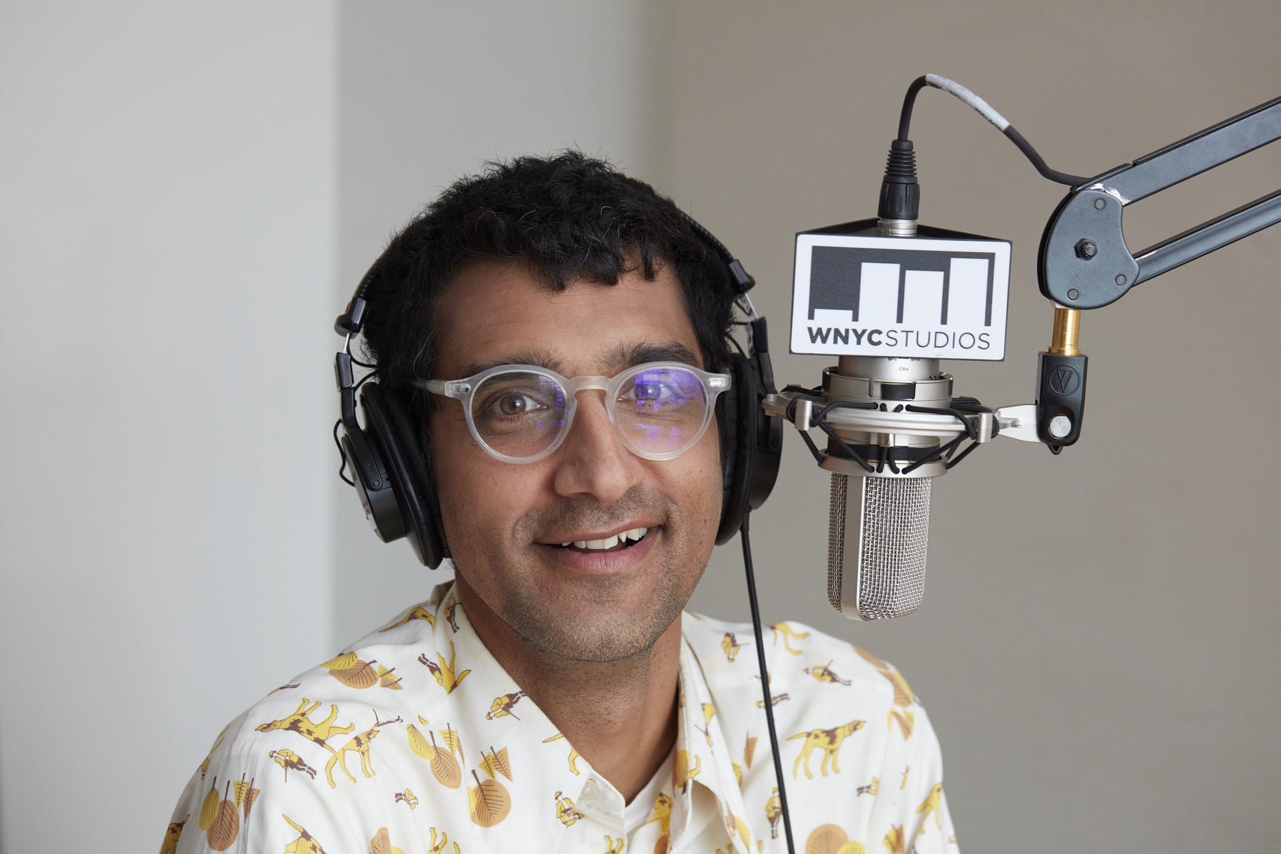 Latif Nasser at a microphone.