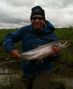 Paul Greenberg with his first catch of the season, a wild chum salmon
