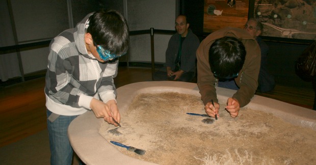 Chris Sander and his cousin, Stephen Gee excavate in the sand pit.