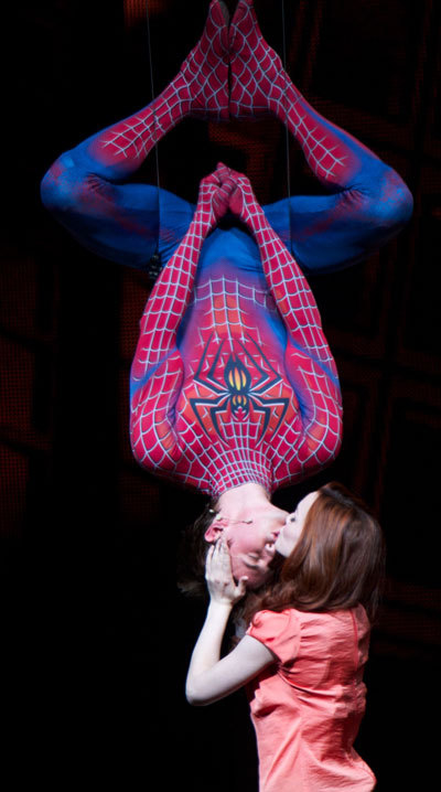 Spider-Man, played by Reeve Carney, and Mary Jane Watson, played by Jennifer Damiano, share a moment in "Spider-Man: Turn Off the Dark."
