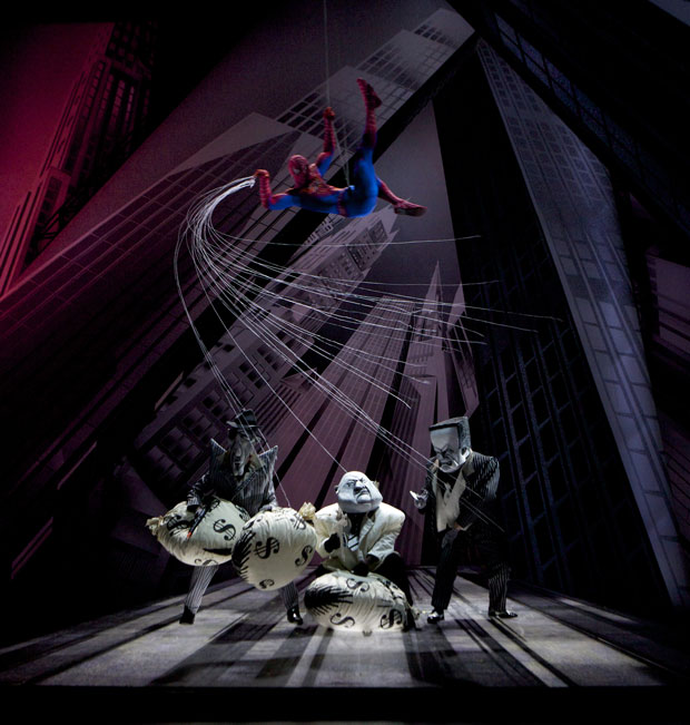 After donning his Spidey suit, Peter Parker gets to business, taking care of cartoonish bad guys with bags of benjamins.