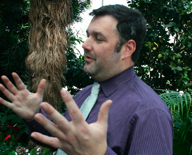 Marc Hachadourian, the NYBG's orchid curator, explains the arrangement of the exhibit.
