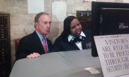 Mayor Bloomberg took some time to learn the ropes from security guard and great grandmother Annie Davis. Davis is a member of 32BJ which represents private security guards that protect municipal buildings.