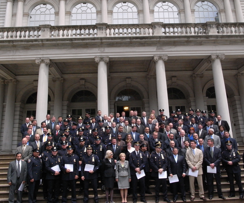 FBI and NYPD and NY State officers meet mayor and governor at City Hall.