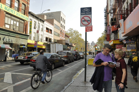 The new bike lane protects riders from cars.