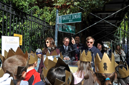 Director Spike Jonze and actress Catherine Keener at the intersection of Greenwich Avenue and Christopher Street temporarily renamed “Maurice Sendak Way” and “Wild Things Way.” (photo by Julienne Schaer / Courtesty of NYC & Company)
